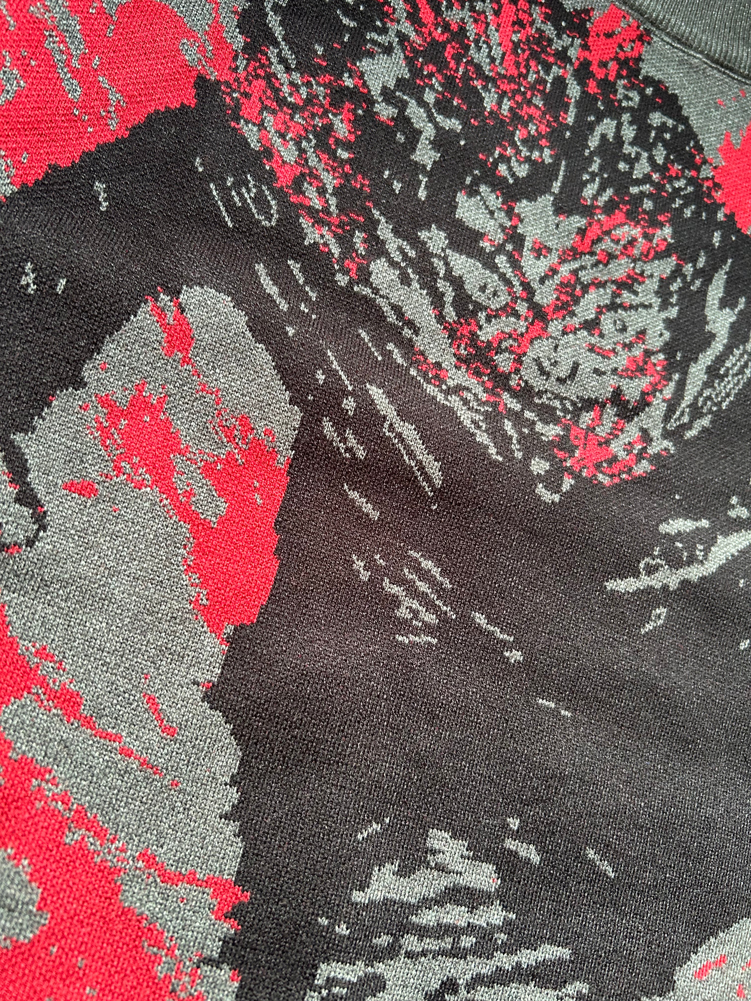 World cutting slash Sweater